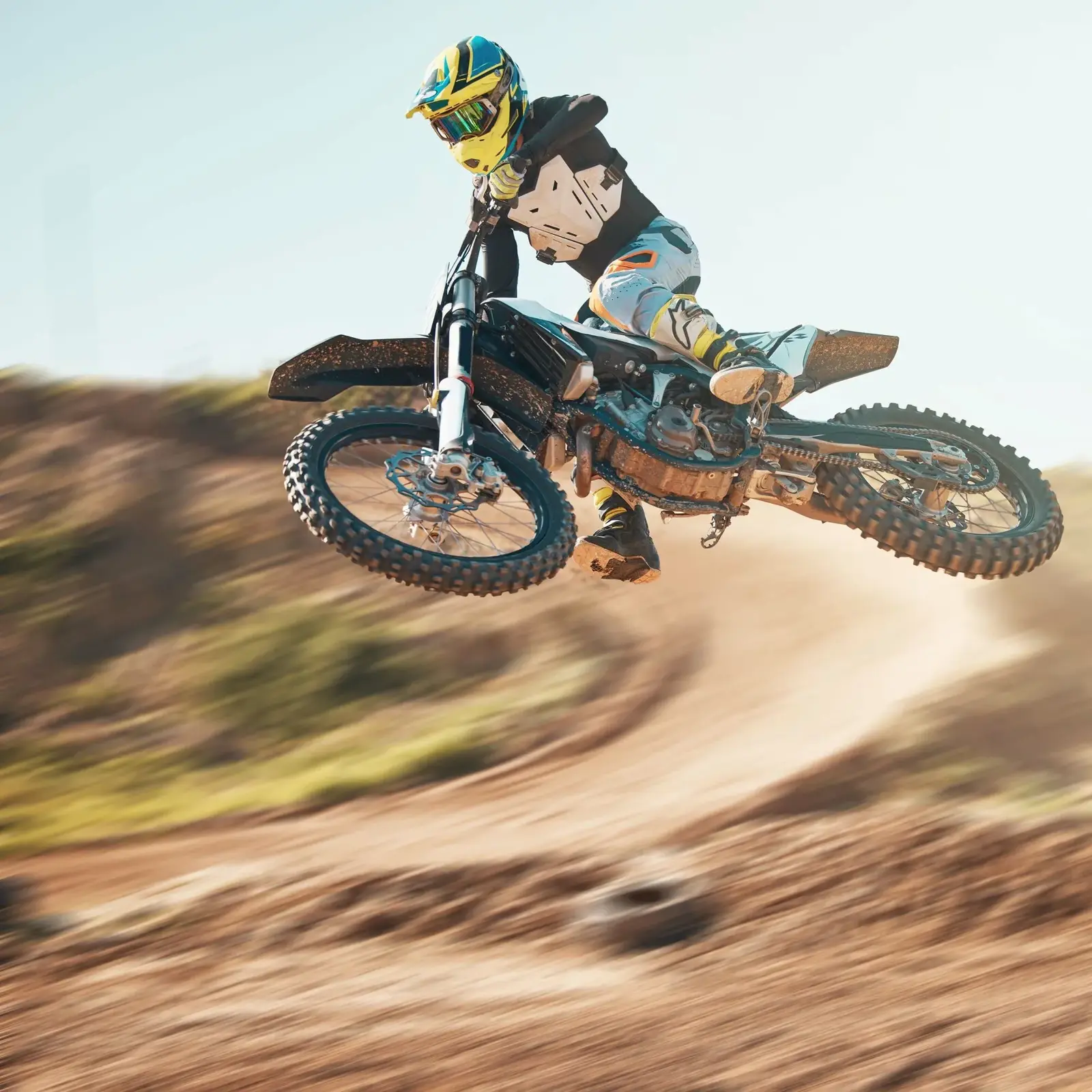 Driver, cycling and air jump on dirt track